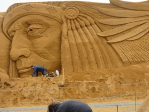 Jamie Wardley making big sand sculpture