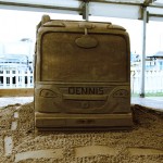 sand sculpture of a dennis dustcart