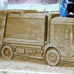sand sculpture of dennis truck