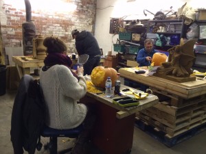 The Sand In Your Eye team busy carving the pumpkins in the workshop
