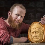 Jamie Wardley, Yorkshire pumpkin carver. Image by REX
