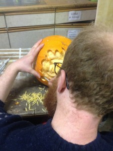 Pumpkin carver beginning the weeks of carving celebrities into pumpkins