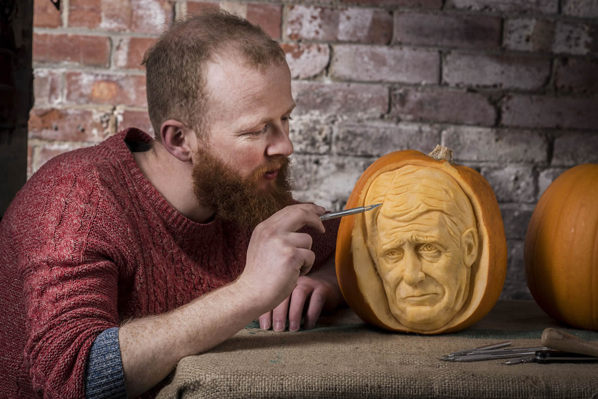 Professional Pumpkin Carver Jamie Wardley, image by REX