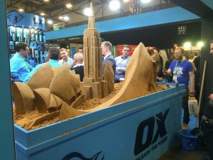 UK sand sculptor Jamie Wardley sculpting live at the trade show event