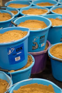 Buckets of sand ready to be used at the trade show event