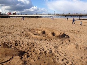 one day beach sand sculpture