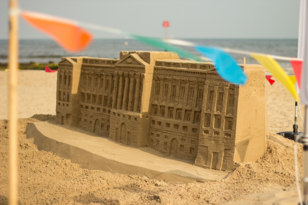 Beach sand sculpture of Buckingham Palace to celebrate the Queen's 90th Birthday
