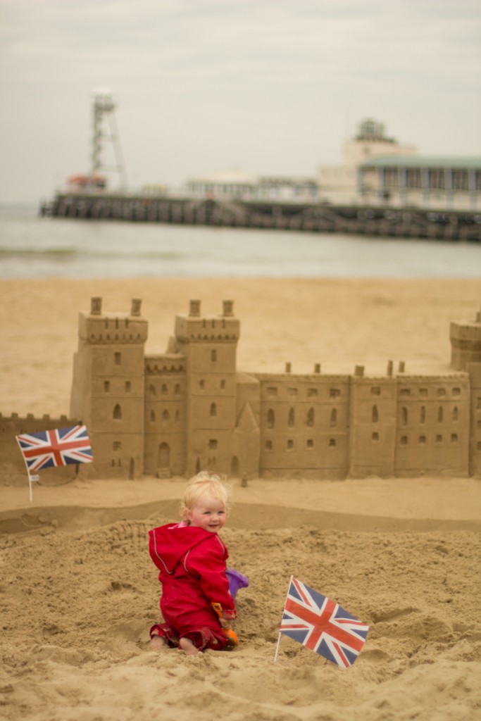 Florence looking pleased with herself with the Windsor Castle sand sculpture to celebrate the Queen's 90th Birthday