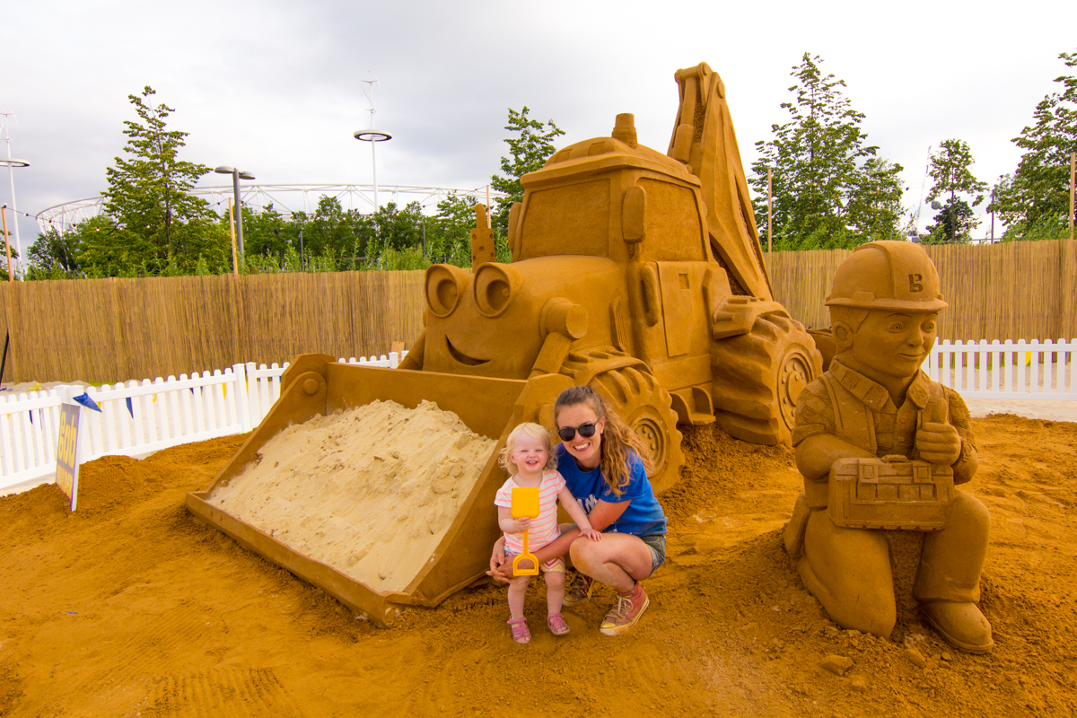 A family of sand sculptors. Claire Jamieson and Florence add the final touches to the sand sculpture