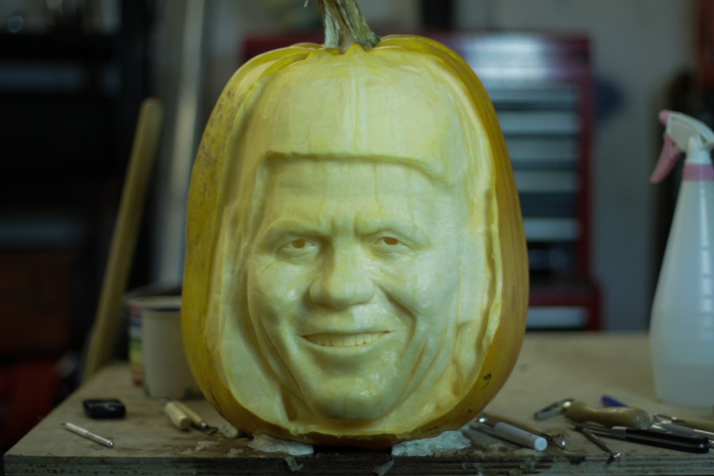 Simon Cowell pumpkin carving progress