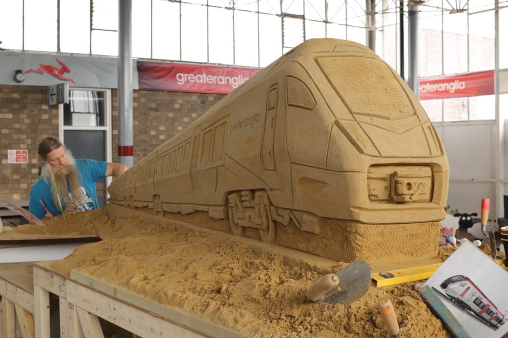 sand sculpture new trains