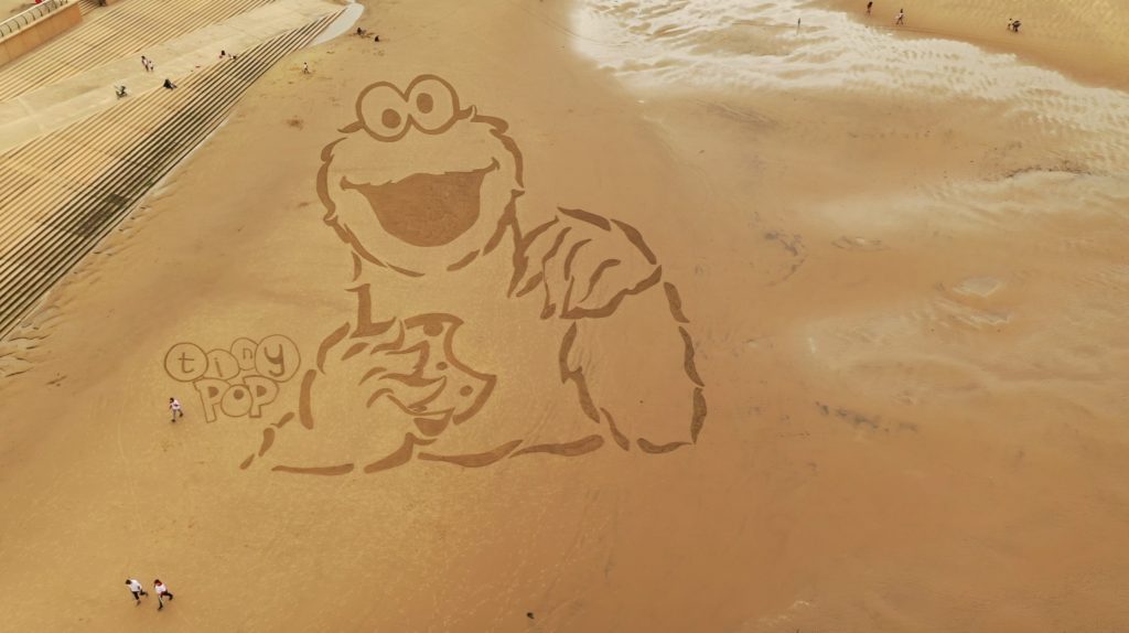 pr advertising sand drawing
