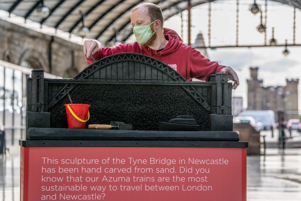 Sculpture of Tyne Bridge unveiled at Newcastle Central Station as part of a series highlighting the environmental credentials of train travel as staycations boom.